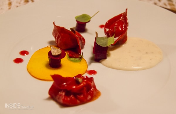 Michelin star plate of food in South tirol mountain hut - luxury travel tips