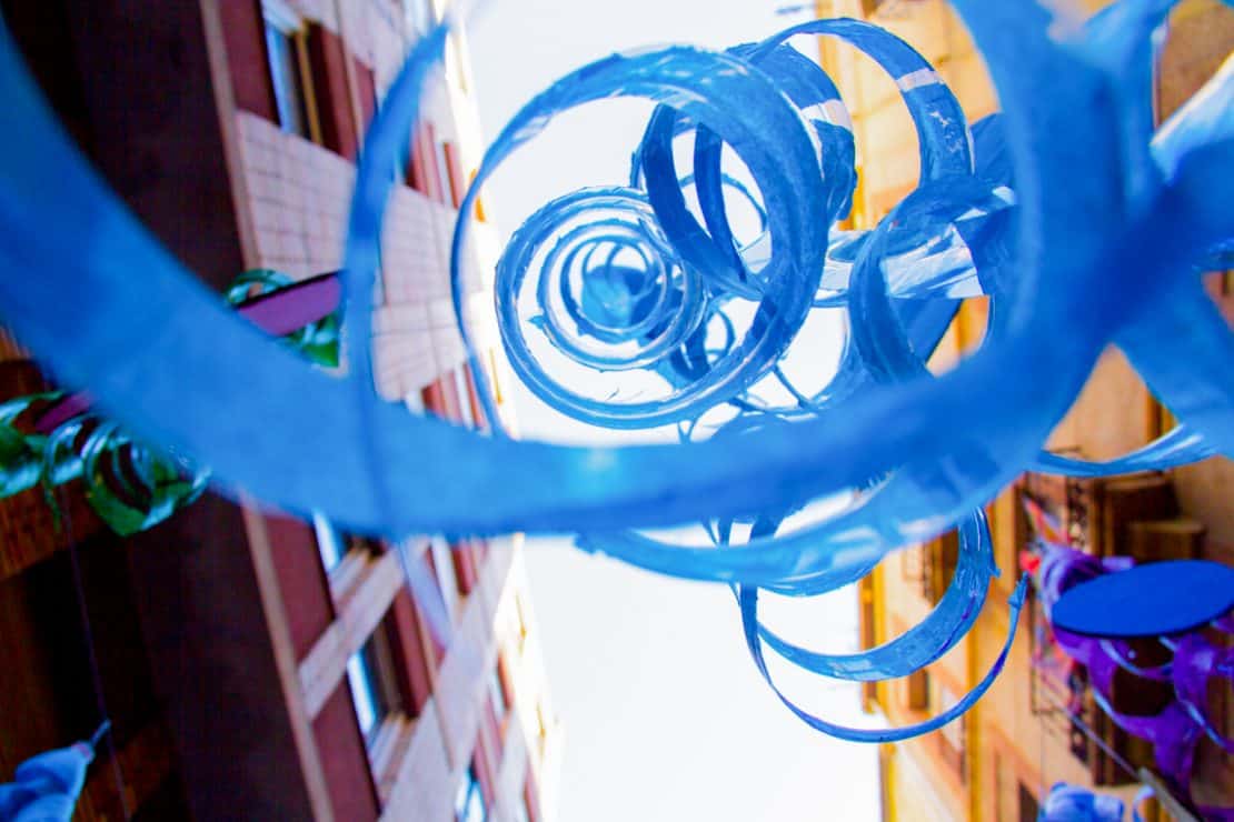 papier mache twirls in the street during the Festival de Gracia in Barcelona - Best Neighbourhoods to Stay in Barcelona,