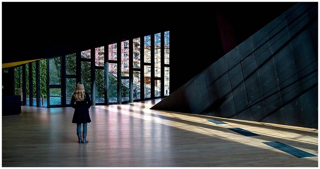 Woman in silhouette standing in the foyer of the Balenciaga Museum near San Sebastian Spain