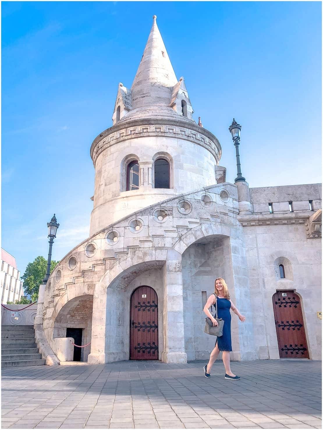 Abigail King walking past turret on Fishermen's Bastion Budapest