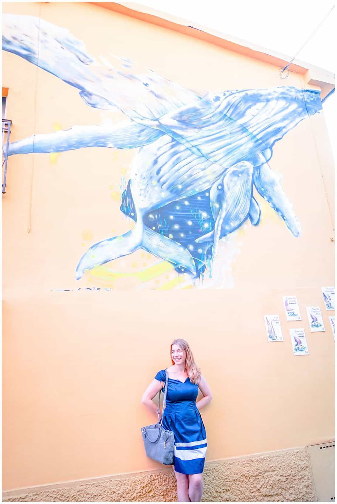 Abigail King of Inside the Travel Lab in Italy Rimini Mural