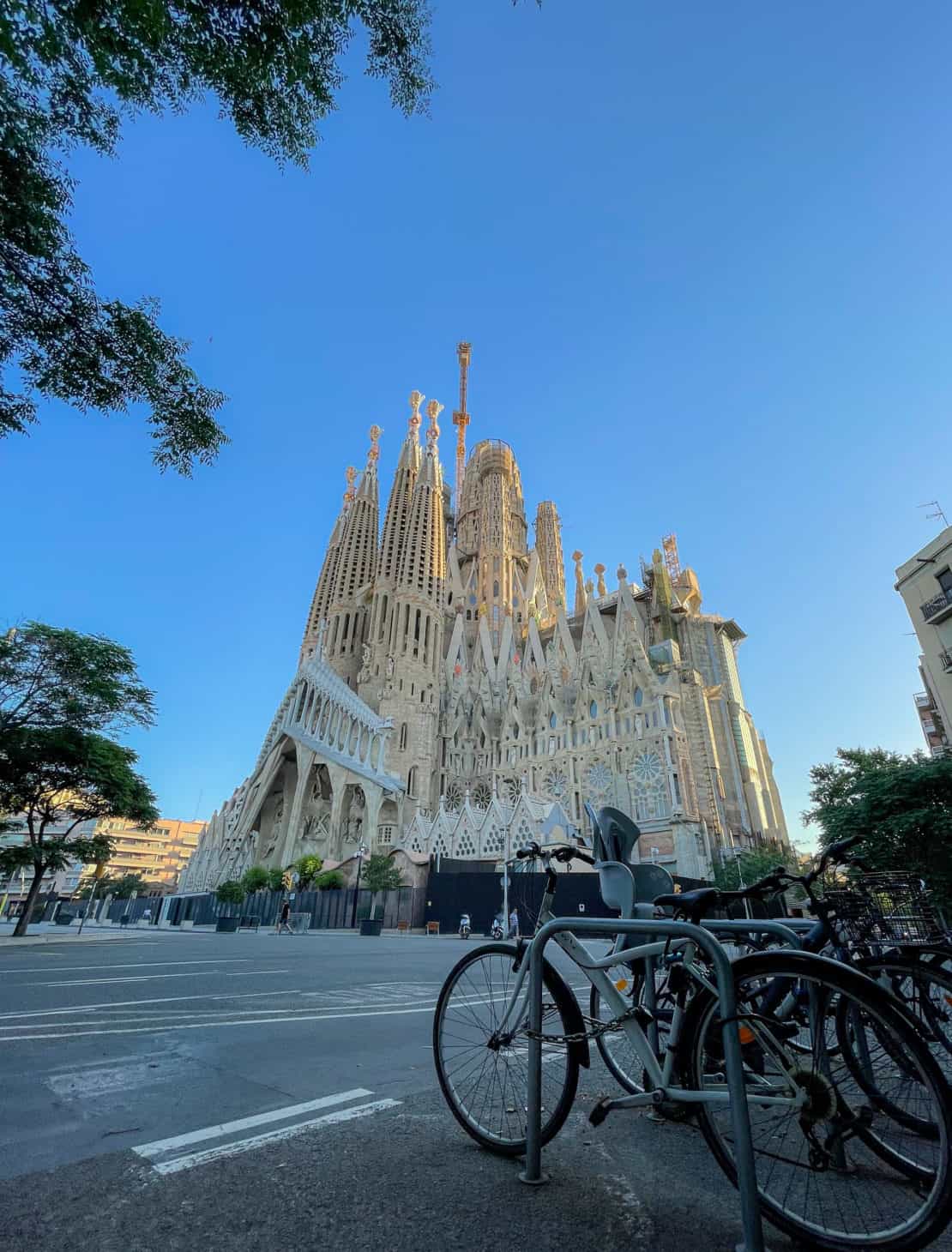 Sagrada Familia in Barcelona with bicycles out front - Best Neighbourhoods to Stay in Barcelona,