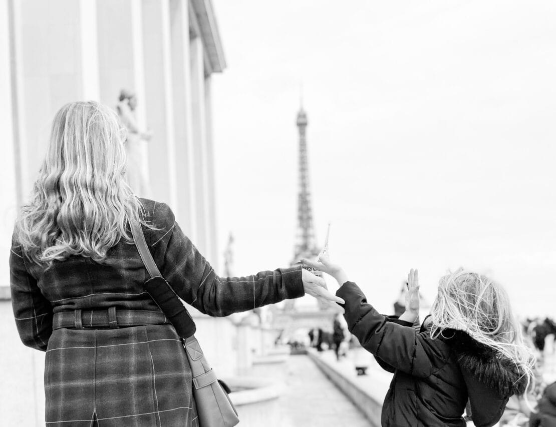 Mother and child by the Eiffel Tower for Paris with Kids Article