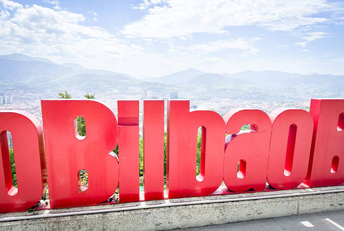 Red Bilbao Letters on hillside Spain