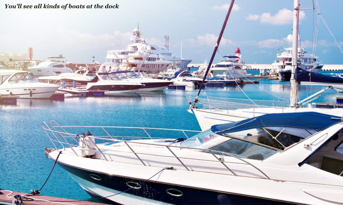 Yachts moored at a dock in the USA - best yacht rental deals 