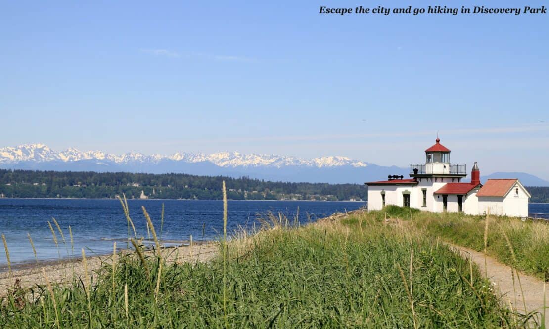 White house and greenery at Discover Park just outside of Seattle - is Seattle worth visiting 